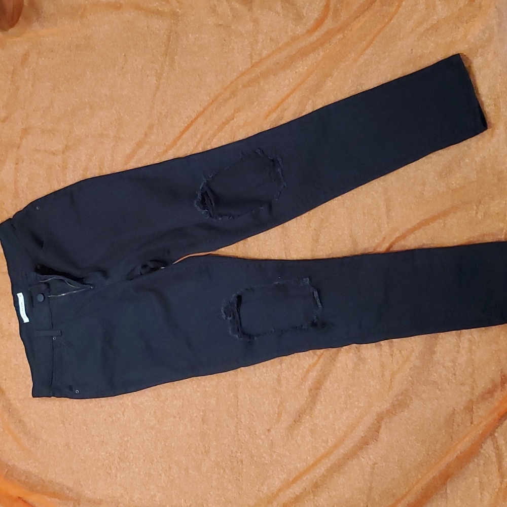 Levi's 711 High Rise Distressed Skinny Jeans